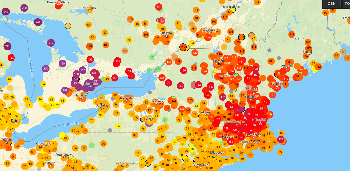 A MAP OF THE NORTHEAST EMPIRE SHOWING A CONCENTRATION OF RED DOTS OVER EASTERN MASSACHUSETTS SIGNIFYING POOR AIR QUALITY